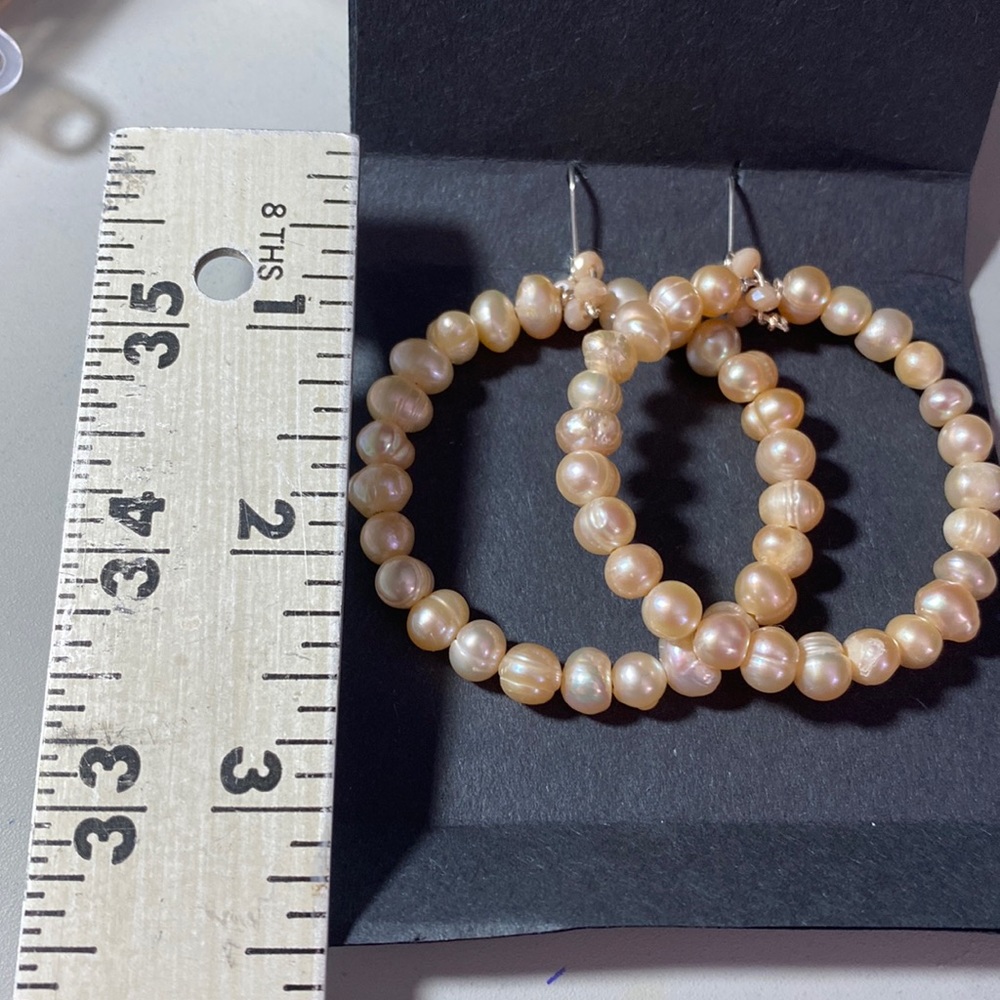 Sterling silver clasps,creamy tan fresh water pearls hoop earring’s. 2 1/8 long